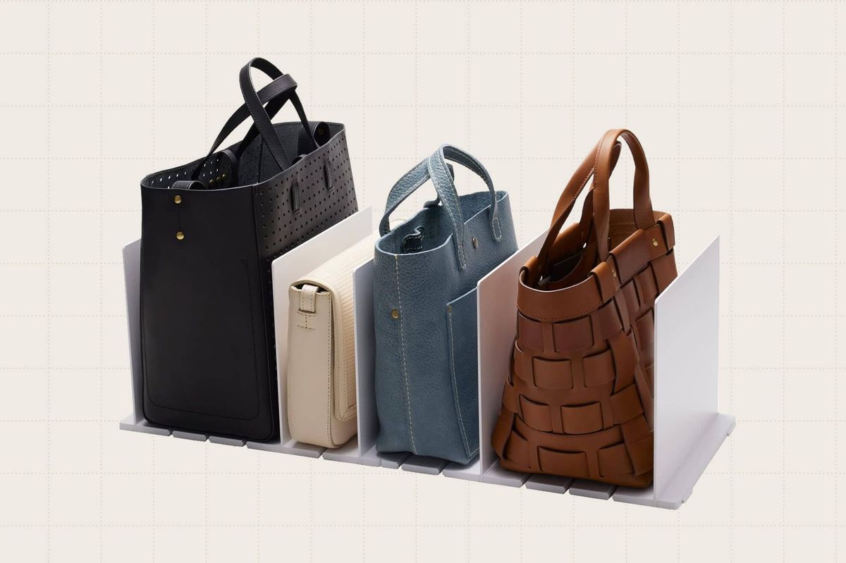 The YAMAZAKI purse organizer/divider in white. The dividers are adjustable to accommodate different sized bags.