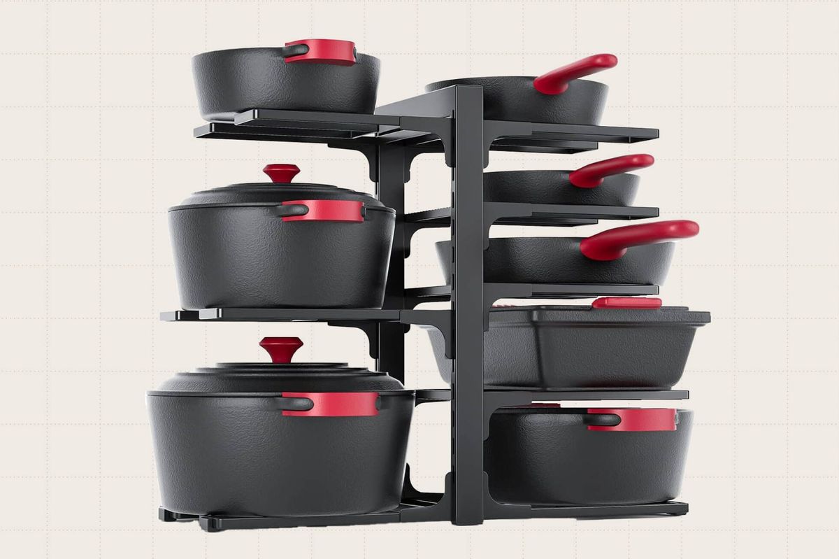 The Mudeela 8-Tier Adjustable Pan Organizer Rack in black. It holds pots, pans, and their lids, and takes advantage of vertical space in your cabinet.