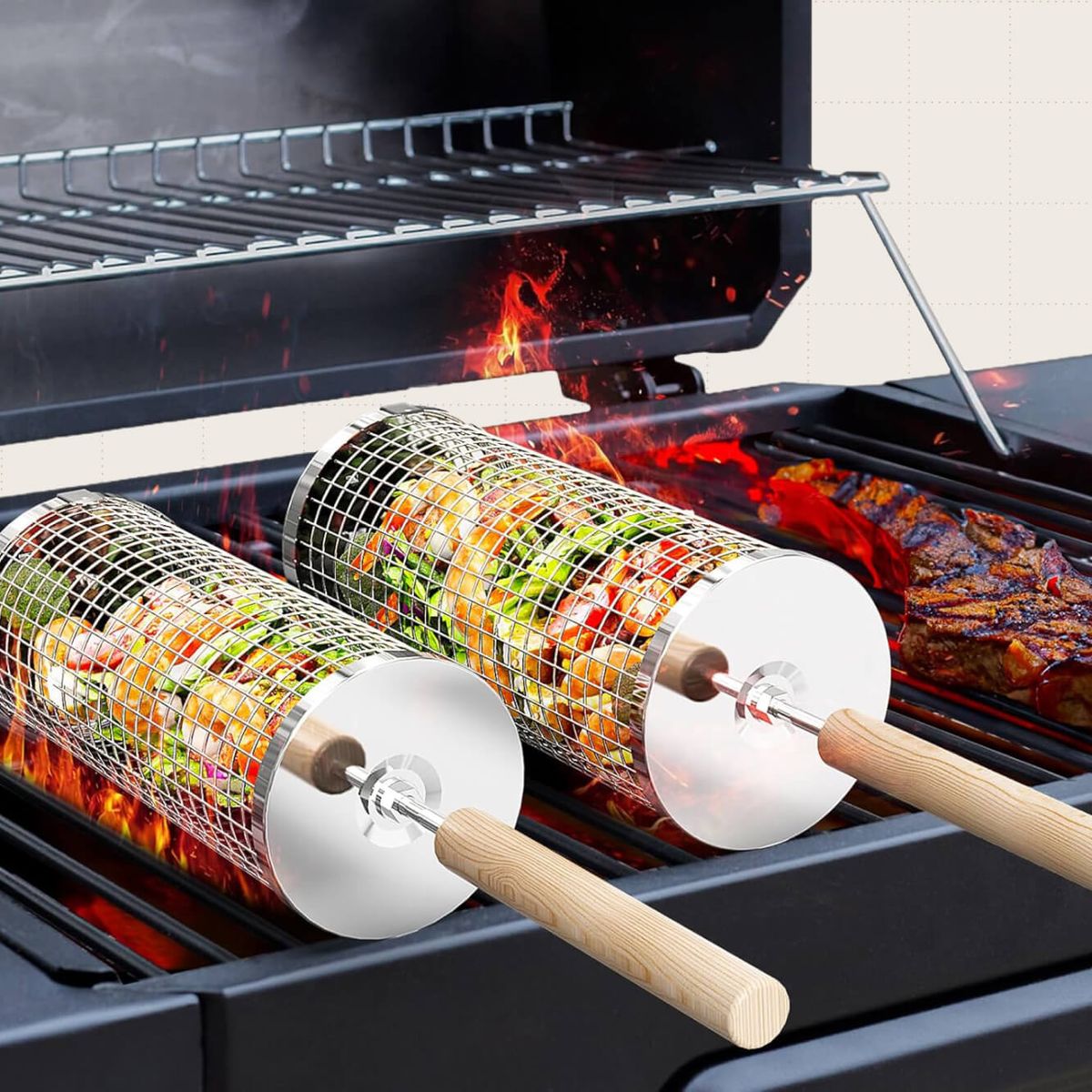 Two cylindrical wire baskets with wooden handles on a grill. Inside the baskets are chopped veggies.