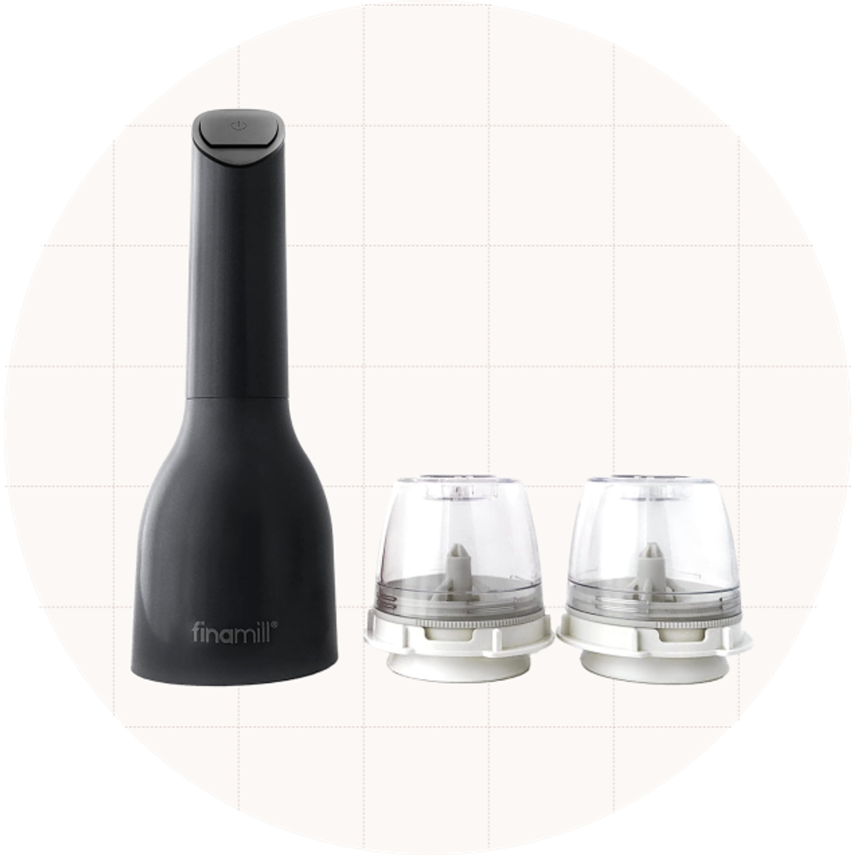 The FinaMill Battery-Operated Spice Grinder in black shown with its two included spice pods.
