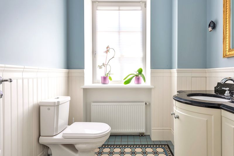 Image of a clean bathroom with a toilet and sink
